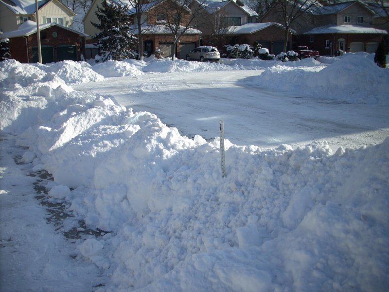 3 x 3 x 20 feet of snow dumped on our driveway.jpg