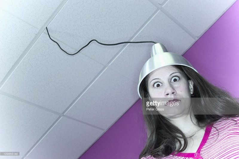 ___ Wire Dropping Down From The Ceiling Setting On Her Head Stock Photo.jpg