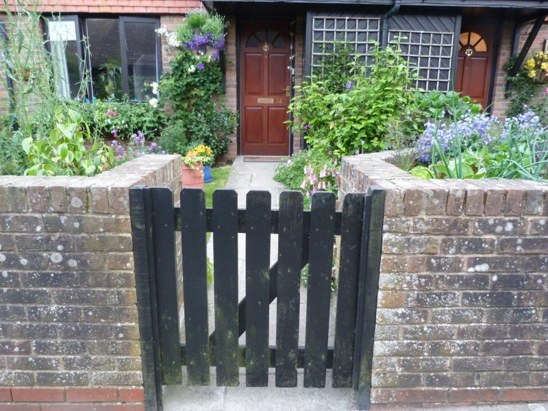 gate and fuchsias 001.JPG