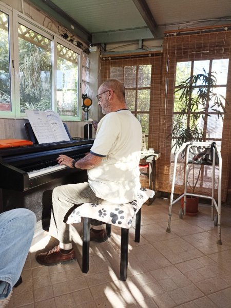 John playing piano 28 dec 22 .jpg