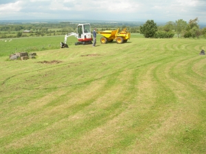 Shape of new bed marked out, machinery on site, June 2011.